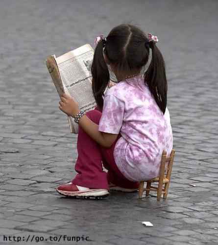 read - kid reading a book