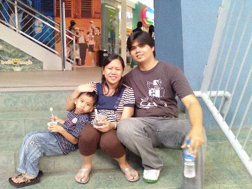 parenting - taken at sm mall of asia while i'm still pregnant with kriana.. with me are my husband and my nephew