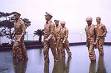 GEn MacArhtur set foot in  Leyte, Philippines on O - GEn MacArthur setting foot in Leyte Philippines to liberate the PHilippines from the Japanese .