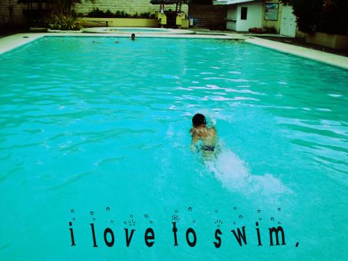 Swimming at the Club House - This was taken during our Summer Vacation. This is in Cebu, Philippines. This place is called Sta. Lucia Clubhouse.