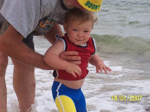 Lukey at the beach - Luke and his poppy at the beach in the water