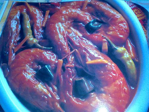 eating food - shrimp with chili sauce