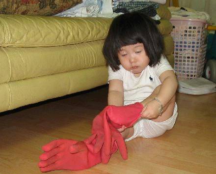 parenting - teaching to put it herself