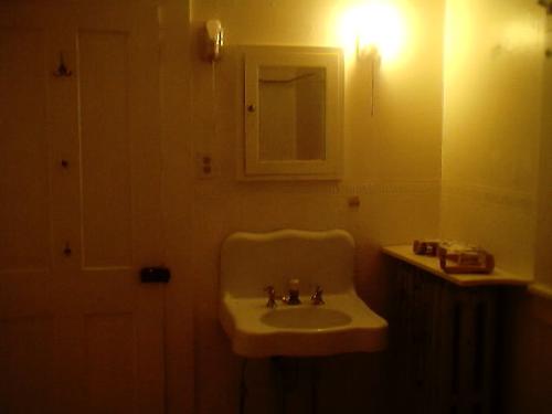 bathroom in old house, sink has separate hot and c - Upstairs 1 bedroom flat's bathroom sink. Look it has a separate hot and cold water faucet. No luke warm for You baby!