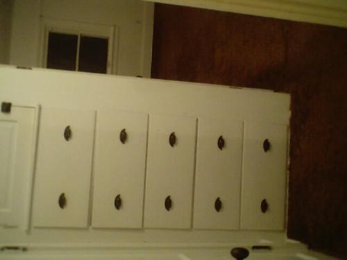 built in drawers in a upstairs 1 bedroom flat in m - what a unique set of drawers built into this old house, lead paint and all.