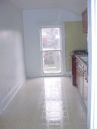 narrow kitchen in top story flat of 1 bedroom apar - New windows installed in this old house, top story 1 bedroom flat in monroe, wisconsin, rental. Lead in the paint, plaster walls, unique old style appeal, and luxury living for any today standards