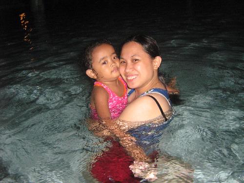 esmie's night swimming birthday party - joan and charlette in the adult pool