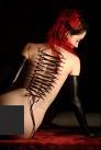 full back pocket piercing - this is a pic of a full back 'pocket' piercing...It is very artistic, but not something i would want to do!