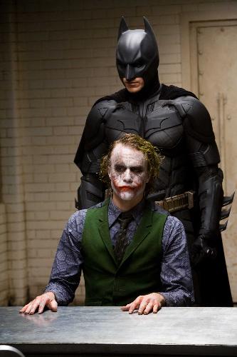 HEATH LEDGER as The Joker and CHRISTIAN BALE as Ba - Batman Questioning Joker in the at the Jail