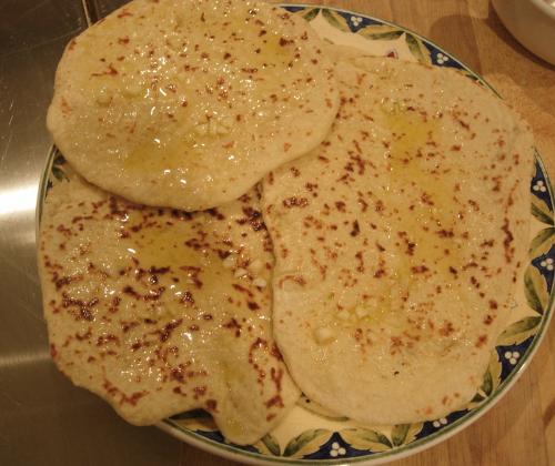 garlic naan - Famous Indian flat bread garlic naan.