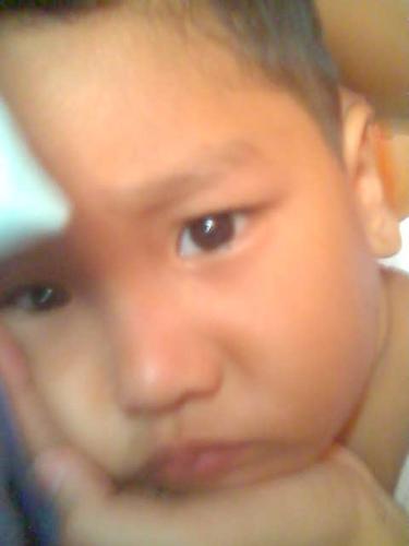 not feeling well.. - my brother, he's not in the mood to smile,.. he's not feeling well that time.. still, he looks so cute.