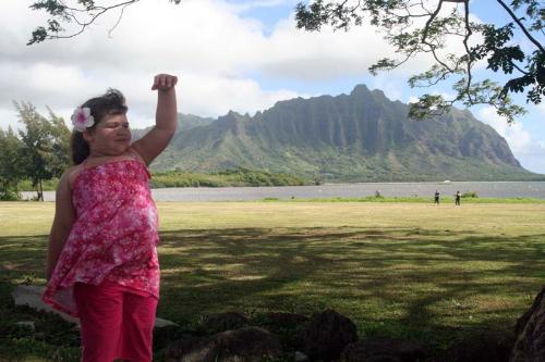 Grand Daughter by the Ocean - This is a photo of my grand daughter on the north shore of Ohau being Hawaniian.