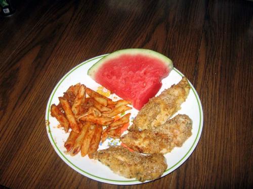 School Lunch - chicken fingers, watermelon, noodle - Example of a lunch