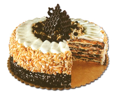 Chocolate Marjolaine - It's a combination of layers of meringue wafers filled with praline cream, topped with rich chocolate, roasted cashews and a tower of premium chocolate. I am in love with the superb taste of this cake and I really crave for it most of the time.