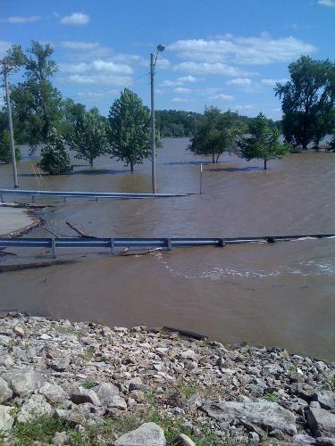 Mississippi River - This is a picture of the Mississippi river in IL. As you can see... it flooded!! I was visiting my mother in July and it was raining so much, that the whole river flooded the park and many arts of the city.
