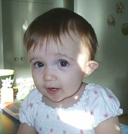 My granddaughter - This is my gorgeous granddaughter, Mackenzie, 14 months old. She has a cheeky look on her face - up to something no doubt!