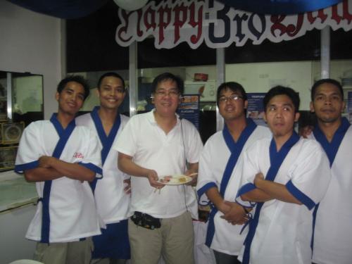 kitchen staff - pics was taken during our 3rd year anniversary, and they wereour kitchen staff with a guestat the center.