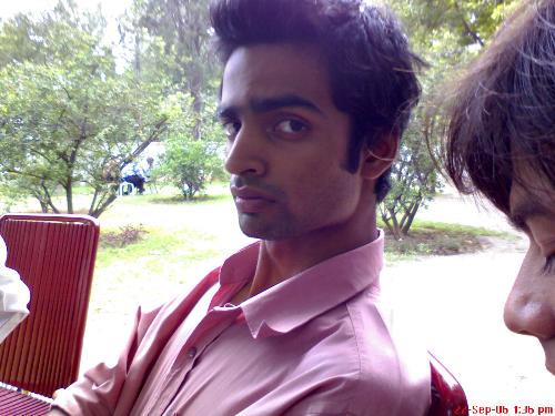 in my university - ths pic was taken in my university. when i see him and he take pic..  it's natural pose!