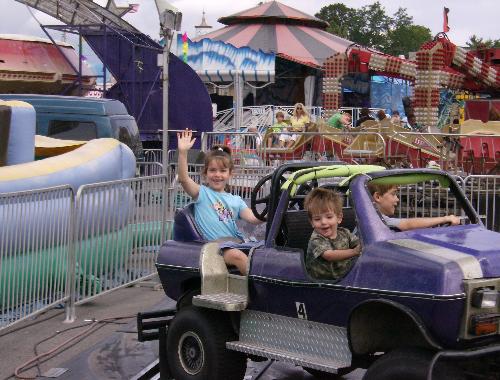 The monster trucks - My twins and my toddler on the monster truck ride at the fair
