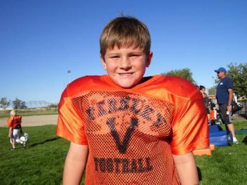 My 7 year old son, Tyler just loves playing footba - My 7 year old son, Tyler just loves playing football!