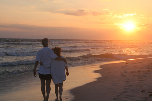 On the beach in Florida - We were on the beach in Florida helping our daughter and her future husband take some potential wedding announcement photos when they took this picture of Jackie and I.