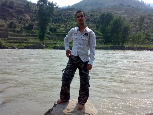 Khalid in TN2 Trip - I took this photo in the summer vocation . This trip was in Pakistan in the First of July to visit our friend's village called Boonie his name is Hassanin.