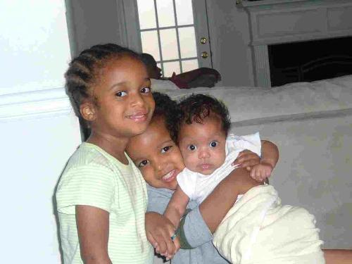 My Trio - My Three Kids - Age 6, Age 5 & Age 2 now. This picture is old but is our favorite shot of them.