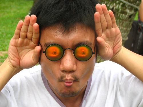 my ugly boyfriend  - taken in singapore.,he made fun of using different eyes.,Ü