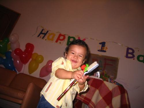 My 2nd son's first birthday - Khalifa Tarik T. Farjani, smiling at the camera, happy, on his first birthday.