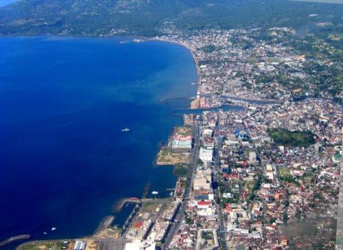 Manado Bay From Above - Manado is Capital Town of North Celebes or Sulawesi Utara. Located at the bay of Manado, it is surrounded by mountainous area. The population are about 417.547 in 2005 here from every part of the world. But the City is dominantly with The Minahasan.  It's founded in the year of 1623  Total area 60.7 sq mi Position 1.30' N - 124.58' E  Motto: Si tou timou tumou tou (Derived from Minahasan which means People lives to make other people live)  For more info about Manado Please follow this link:  http://en.wikipedia.org/wiki/Manado