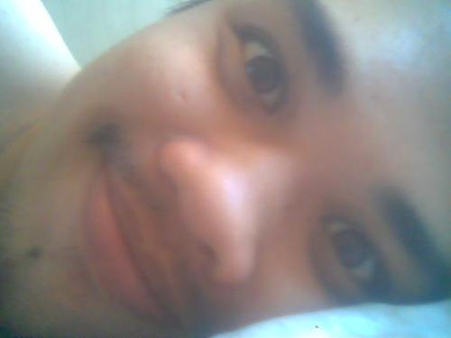 This is me - I was very sleepy in this time but still I found a way on how to make my self proud by making a smile.