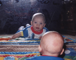 Mirror... mirror on the wall - My son when he was a baby back in '95. He is now 13 and much bigger now, but I still love this picture.
