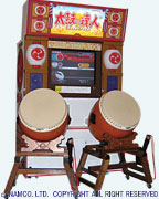 Taiko: Drum Master - 'Taiko: Drum Master' (English title), also known as 'Taiko no Tatsujin' (?????; 'Taiko Master') is a drumming game for the Sony PlayStation 2 based off the popular Japanese arcade game. A drum simulating the taiko is played in time with music. It is made by Namco. The home version can be played with a TaTaCon, a special controller which looks like the face of a Taiko drum. Players control one of the two main characters - Don, a red-faced and blue body taiko, and Katsu, a blue-faced and red body taiko.   - wikipedia.org