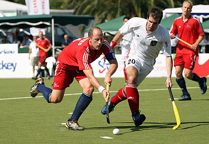 hockey - hockey the game with sticks and hard ball