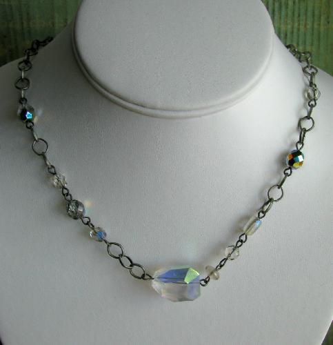 Ice Necklace - Made with an antiqued silver chain and an assortment of clear glass beads. Measures just over 16' in length and is finished with a lobster clasp. Will be available soon in my Etsy.com shop