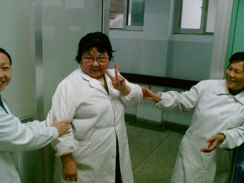 my teacher - this lovely women in the central of picture is my teacher who teachered me learn medical cell photos of body.