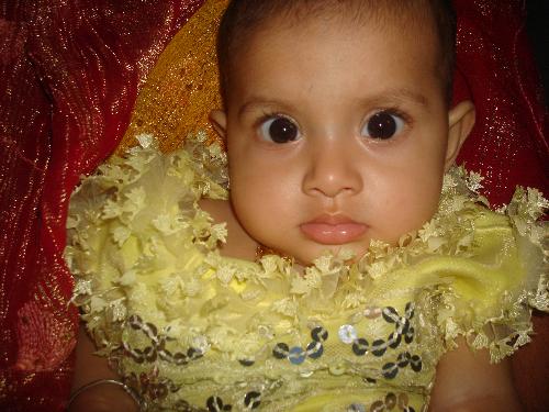 cute child - this is a child , a nice child, a cute child. eyes are too round, and face is too cute, its nice to see and see for ever.