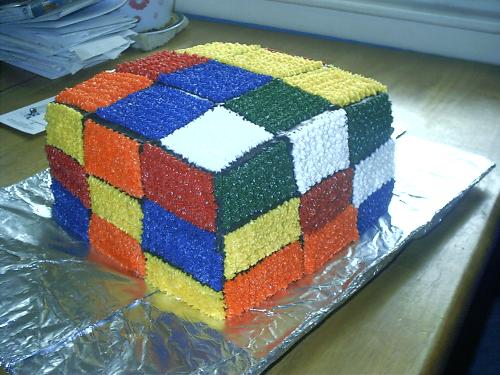 here is a photograph of a rubik cube cake that i m - here is a photograph of a rubik cube cake that i made...