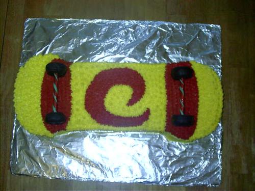here is a photograph of a skateboard cake that i m - here is a photograph of a skateboard cake that i made....