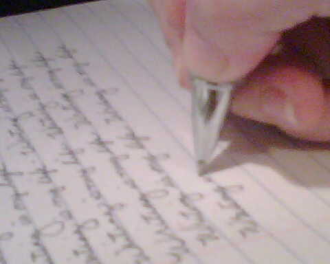 Me, writing. - This is a photo of mine. In is my hand writing over and over,'Writing is my life. Writing truly is my life.