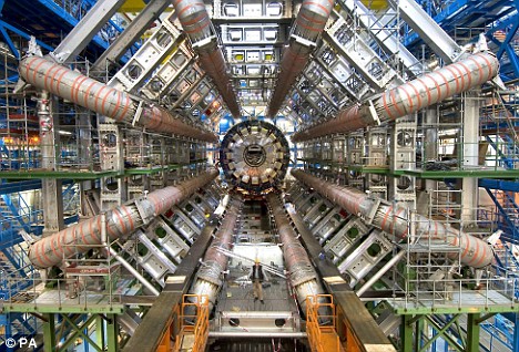 The Large Hadron Collider...The Machine behind the - The Large Hadron Collider smashes particles together at nearly the speed of light. The Large Hadron Collider...The Machine behind the - The Large Hadron Collider smashes particles together at nearly the speed of light.