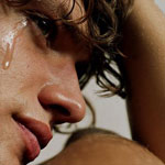 men crying - a picture of a male shedding a tear