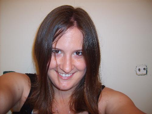 A picture of when I had long hair. I cut it off al - Hanging out at one of our old apartments.