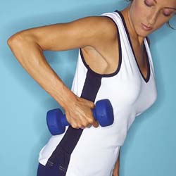 Body Sculpting - Woman using weights to sculpt her body and tone her muscles. Gotta love the results!