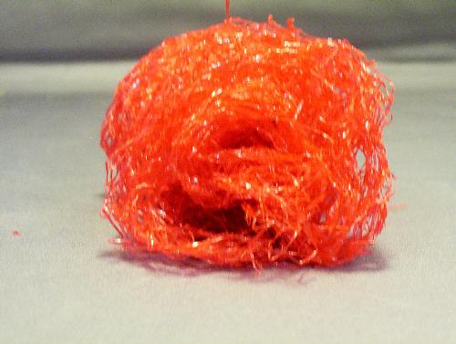 Net Bag Rose Scrubby - I repurposed a plastic net bag that apples were packaged in to make this rose bud scrubby. It's great for cleaning any kind of dish, from fine china and crystal to coated cookware because it will scrub clean without scratching the surface
