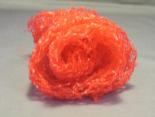 Plast net bag rose bud scrubby - I made this plastic net bag into a rose bud to scrub dishes with Plast net bag rose bud scrubby - I made this plastic net bag into a rose bud to scrub dishes with