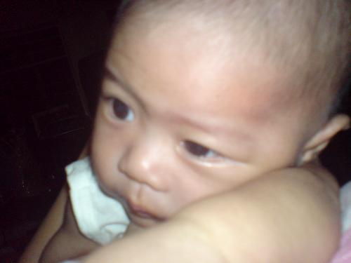 dylan is thinking...shhhhhhhhhhhh - After a long sleep, finally he is awake! I think he is seriously thinking..hehe