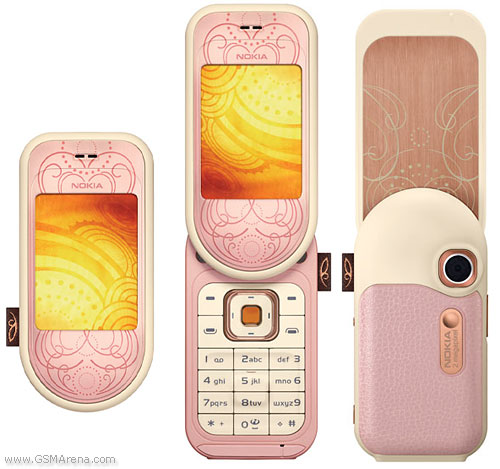 Nokia 7373 - Ethnic patterns and a compact swivel design gives the Nokia 7373 its fresh look and perfect grip. Elaborate tribal markings provide a unique point for contemporary design interpretation, where form and decoration are married seamlessly together. This results in finely tooled surfaces, exquisite detail, embossed finishing and further decoration when the mobile phone is opened, proving that the Nokia 7373 is a veritable treasure chest of reference and culture.