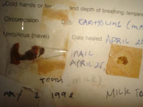 babys cord and first nail cut - souvenirs from her all first. pictures that will never be forgotten. thats how i cherish them.