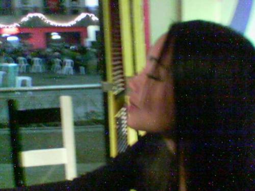Life - Photo taken at clockwork lounge back in 2005. A customer that likes alternative music. It seems that she is happy and contented at this very moment. This is life.
